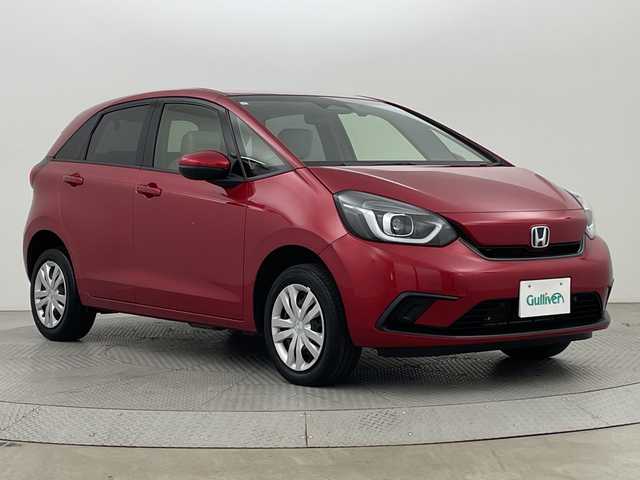 ホンダ フィット ホーム 新潟県 2021(令3)年 6.4万km プレミアムクリスタルレッドM ワンオーナー/4WD/スマートキー/スペアキー1本/9インチナビ　型式VXU-205FTi/ドライブレコーダー前後/フルセグ/CD/DVD/USB/バックカメラ/ハーフレザー/コーナーセンサー/ホンダセンシング/新車時保証書/取扱説明書