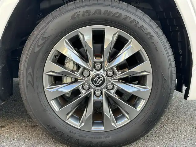 トヨタ ランドクルーザー ZX 栃木県 2024(令6)年 0.4万km プレシャスホワイトパール ワンオーナー/サンルーフ/JBLプレミアムサウンドシステム/リヤエンターテインメントシステム/モデリスタエアロ/寒冷地仕様/ヘッドアップディスプレイ/パワーバックドア/純正20inAW/ベージュレザーシート/メーカーOPナビ/フルセグTV/BT/Carplay/マルチテレインモニター/TOYOTAセーフティセンス/プリクラッシュセーフティ/レーントレーシングアシスト/ドライバー異常時対応システム/レーダークルーズコントロール/ロードサインアシスト/アダプティブハイビーム/オートハイビーム/ブラインドスポットモニター