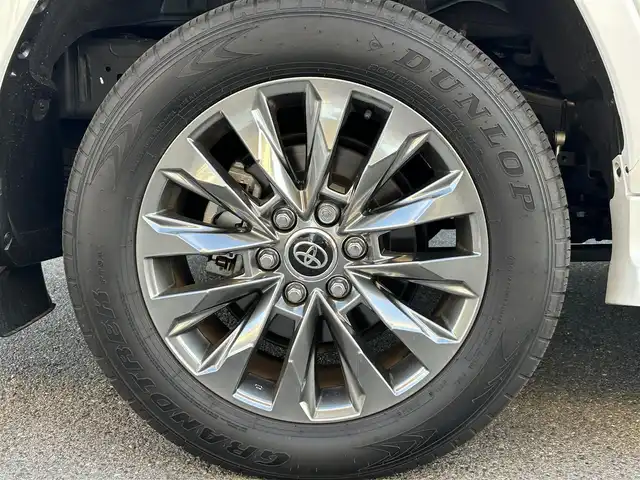 トヨタ ランドクルーザー ZX 栃木県 2024(令6)年 0.4万km プレシャスホワイトパール ワンオーナー/サンルーフ/JBLプレミアムサウンドシステム/リヤエンターテインメントシステム/モデリスタエアロ/寒冷地仕様/ヘッドアップディスプレイ/パワーバックドア/純正20inAW/ベージュレザーシート/メーカーOPナビ/フルセグTV/BT/Carplay/マルチテレインモニター/TOYOTAセーフティセンス/プリクラッシュセーフティ/レーントレーシングアシスト/ドライバー異常時対応システム/レーダークルーズコントロール/ロードサインアシスト/アダプティブハイビーム/オートハイビーム/ブラインドスポットモニター