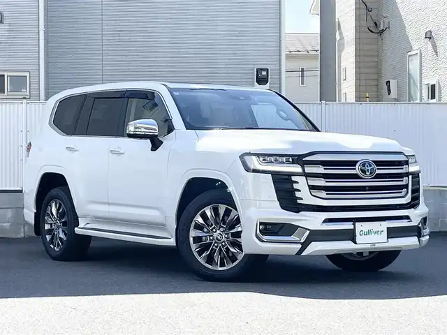 トヨタ ランドクルーザー ZX 栃木県 2024(令6)年 0.4万km プレシャスホワイトパール ワンオーナー/サンルーフ/JBLプレミアムサウンドシステム/リヤエンターテインメントシステム/モデリスタエアロ/寒冷地仕様/ヘッドアップディスプレイ/パワーバックドア/純正20inAW/ベージュレザーシート/メーカーOPナビ/フルセグTV/BT/Carplay/マルチテレインモニター/TOYOTAセーフティセンス/プリクラッシュセーフティ/レーントレーシングアシスト/ドライバー異常時対応システム/レーダークルーズコントロール/ロードサインアシスト/アダプティブハイビーム/オートハイビーム/ブラインドスポットモニター