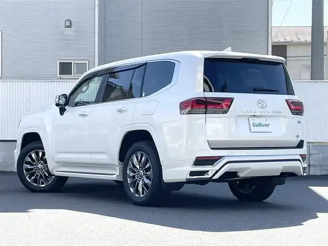 トヨタ ランドクルーザー ZX 栃木県 2024(令6)年 0.4万km プレシャスホワイトパール ワンオーナー/サンルーフ/JBLプレミアムサウンドシステム/リヤエンターテインメントシステム/モデリスタエアロ/寒冷地仕様/ヘッドアップディスプレイ/パワーバックドア/純正20inAW/ベージュレザーシート/メーカーOPナビ/フルセグTV/BT/Carplay/マルチテレインモニター/TOYOTAセーフティセンス/プリクラッシュセーフティ/レーントレーシングアシスト/ドライバー異常時対応システム/レーダークルーズコントロール/ロードサインアシスト/アダプティブハイビーム/オートハイビーム/ブラインドスポットモニター