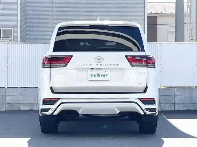 トヨタ ランドクルーザー ZX 栃木県 2024(令6)年 0.4万km プレシャスホワイトパール ワンオーナー/サンルーフ/JBLプレミアムサウンドシステム/リヤエンターテインメントシステム/モデリスタエアロ/寒冷地仕様/ヘッドアップディスプレイ/パワーバックドア/純正20inAW/ベージュレザーシート/メーカーOPナビ/フルセグTV/BT/Carplay/マルチテレインモニター/TOYOTAセーフティセンス/プリクラッシュセーフティ/レーントレーシングアシスト/ドライバー異常時対応システム/レーダークルーズコントロール/ロードサインアシスト/アダプティブハイビーム/オートハイビーム/ブラインドスポットモニター