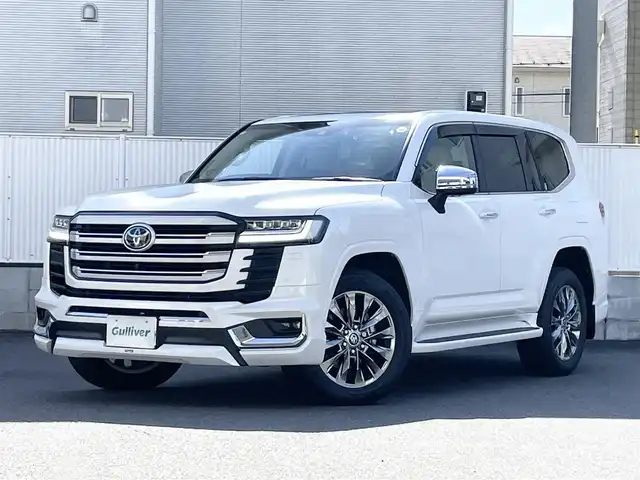 トヨタ ランドクルーザー ZX 栃木県 2024(令6)年 0.4万km プレシャスホワイトパール ワンオーナー/サンルーフ/JBLプレミアムサウンドシステム/リヤエンターテインメントシステム/モデリスタエアロ/寒冷地仕様/ヘッドアップディスプレイ/パワーバックドア/純正20inAW/ベージュレザーシート/メーカーOPナビ/フルセグTV/BT/Carplay/マルチテレインモニター/TOYOTAセーフティセンス/プリクラッシュセーフティ/レーントレーシングアシスト/ドライバー異常時対応システム/レーダークルーズコントロール/ロードサインアシスト/アダプティブハイビーム/オートハイビーム/ブラインドスポットモニター