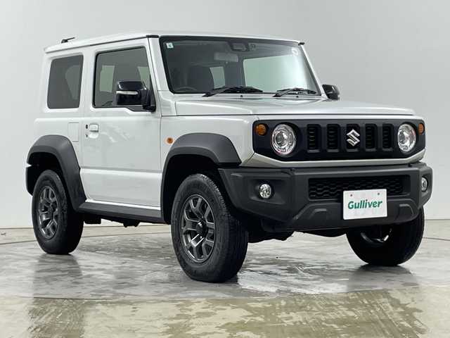 スズキ ジムニー シエラ JC 道央・札幌 2023(令5)年 0.4万km ピュアホワイトP ・４WD/スズキ セーフティ サポート/・デュアルセンサーブレーキサポート　/・純正メモリナビ/・CD/DVD/USB/SD/フルセグTV/・Bluetooth接続/・クルーズコントロール/・レーンキープアシスト/・ヒルディセントコントロール/・純正前後ドライブレコーダー/・LEDオートライト/・前席シートヒーター/・ステアリングスイッチ/・純正フロアマット/・電動格納ミラー/ミラーヒーター/・スマートキー/スペアキー