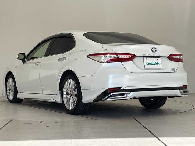 トヨタ カムリ G レザーパッケージ 愛知県 2018(平30)年 1.7万km プラチナホワイトパールマイカ トヨタセーフティセンス/純正8型ナビ　SDカードなし/モデリスタエアロ/レーダークルーズコントロール/ベージュレザー/シートヒーター/バックカメラ/パワーシート/コーナーセンサー/純正アルミホイール/ETC2.0/ブラインドスポットモニター/LEDヘッドライト/オートマチックハイビーム/ドライブレコーダー/衝突軽減システム/フルセグ/CD DVD/Bluetooth/ステアリングスイッチ/スマートキー/プッシュスタート