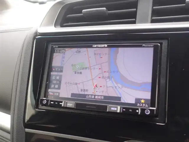 ホンダ フィット ハイブリット Fパッケージ 山形県 2016(平28)年 5.2万km タフホワイトⅡ 4WD/衝突被害軽減システム/メモリナビ/　　【CD DVD BT USB AUX】/アイドリングストップ/電動格納ウィンカーミラー/ワイパーデアイサー/フロアマット/ドアバイザ―/AAC/スマートキー/ETC