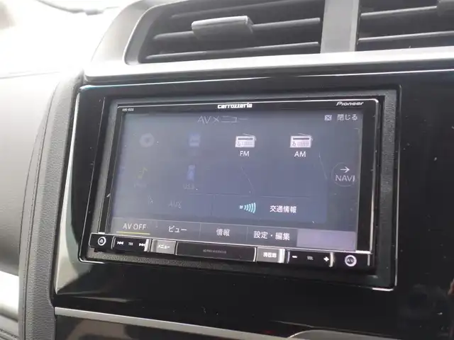 ホンダ フィット ハイブリット Fパッケージ 山形県 2016(平28)年 5.2万km タフホワイトⅡ 4WD/衝突被害軽減システム/メモリナビ/　　【CD DVD BT USB AUX】/アイドリングストップ/電動格納ウィンカーミラー/ワイパーデアイサー/フロアマット/ドアバイザ―/AAC/スマートキー/ETC