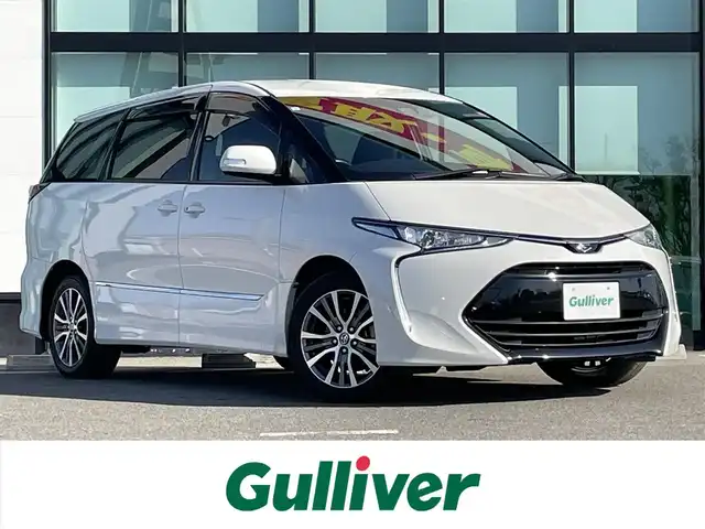 トヨタ エスティマ アエラス 和歌山県 2019(令1)年 2万km ホワイトパールクリスタルシャイン 純正7インチナビ/フルセグTV/Bluetooth/CD/DVD/SD/バックカメラ/ビルトインETC/ドライブレコーダー/衝突軽減カメラ/車線逸脱防止機能/クルーズコントロール/両側パワースライドドア/革巻きステアリング/ステアリングスイッチ/LEDヘッドライト/オートライト/オートハイビーム/純正17インチAW/ドアバイザー/フロアマット/プッシュスタート/スマートキー