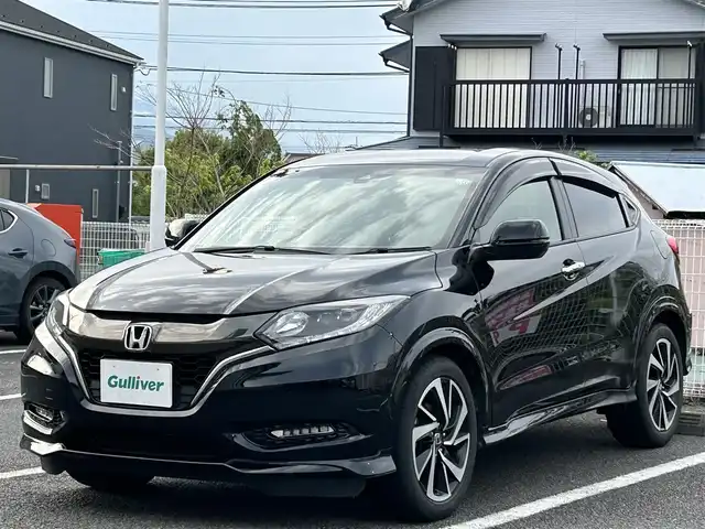 ホンダ ヴェゼル 静岡県 2016(平28)年 9.7万km クリスタルブラックパール ワンオーナー/純性ＳＤナビ(VXM-174VFi)/【CD/DVD/BT/地デジ】/純性LEDヘッドライト/純正18インチアルミホイール/クルーズコントロール/ハーフレザーシート/ETC/USB端子/スマートキー/ECONモード