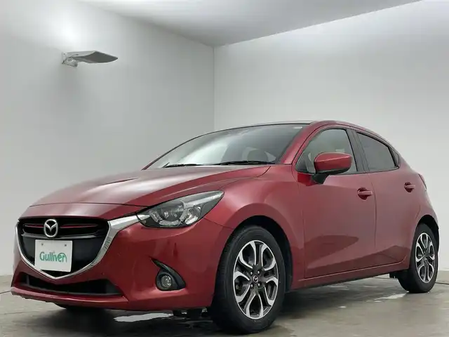 マツダ デミオ XD ツーリング Lパッケージ 岡山県 2015(平27)年 8.2万km ソウルレッドプレミアムメタリック 衝突軽減ブレーキ/オートハイビーム/ブラインドスポットモニター/純正SDナビ/(フルセグ/BT/CD/DVD/USB)/バックカメラ/ETC/ヘッドアップディスプレイ/クルーズコントロール/プッシュスタート/スマートキー×２/純正16インチアルミホイール