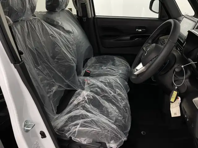 三菱 デリカミニ T プレミアム 新潟県 2025(令7)年 0.1万km未満 アメジストブラック/シルキーホワイト ４WD/登録未使用車/禁煙車/マイパイロット/純正9インチディスプレイオーディオ/　　AM/FM/BT/USB/applecarplay/androidauto/アラウンドビューモニター/両側パワースライドドア/ハンズフリー オートスライドドア/レーダークルーズコントロール/LEDオートライト/ハーフレザーシート/前席シートヒーター/純正15インチアルミホイール付/アイドリングストップ/ステアリングスイッチ/パドルシフト/ステアリングヒーター/電動パーキングブレーキ/オートブレーキホールド/ダウンヒルアシストコントロール/サーキュレーター/リアサンシェード/リアパーソナルデーブル/スペアキー/スマートキー