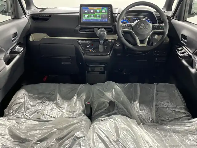 三菱 デリカミニ T プレミアム 神奈川県 2025(令7)年 0.1千km 緑Ⅱ 届出済未使用車/ターボ/サイドデカール/ルーフレール/2トーンカラー/純正9型ディスプレイオーディオ【DA22JM】/Androidauto　Applecarplay　AUX　USB　Bluetooth　IPOD/マルチアラウンドビューモニター/両側電動スライドドア【サンシェード】/デジタルルームミラー/e-アシスト/マイパイロット/衝突被害軽減ブレーキ/踏み間違い防止アシスト/車線逸脱警報システム/車線逸脱防止支援機能/前方衝突予測警報/標識認識機能/先行車発進通知/オートマチックハイビーム/ふらつき警報/レーダークルーズコントロール/車線維持支援機構/前後ソナー/アイドリングストップ/ハーフレザーシート/前席シートヒーター/革巻きステアリング/パドルシフト/ステアリングヒーター/ダウンヒルアシストコントロール/プラズマクラスター付リアサーキュレーター/電動パーキングブレーキ/AVH/プッシュスタート/スマートキー/LEDヘッド/フォグランプ/オートライト/純正リアスポイラー/純正15インチアルミホイール/取説　保証書　スペアキー