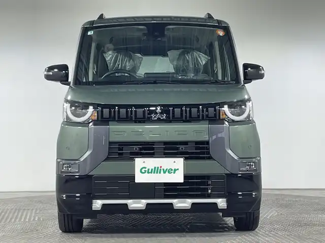 三菱 デリカミニ T プレミアム 神奈川県 2025(令7)年 0.1千km 緑Ⅱ 届出済未使用車/ターボ/サイドデカール/ルーフレール/2トーンカラー/純正9型ディスプレイオーディオ【DA22JM】/Androidauto　Applecarplay　AUX　USB　Bluetooth　IPOD/マルチアラウンドビューモニター/両側電動スライドドア【サンシェード】/デジタルルームミラー/e-アシスト/マイパイロット/衝突被害軽減ブレーキ/踏み間違い防止アシスト/車線逸脱警報システム/車線逸脱防止支援機能/前方衝突予測警報/標識認識機能/先行車発進通知/オートマチックハイビーム/ふらつき警報/レーダークルーズコントロール/車線維持支援機構/前後ソナー/アイドリングストップ/ハーフレザーシート/前席シートヒーター/革巻きステアリング/パドルシフト/ステアリングヒーター/ダウンヒルアシストコントロール/プラズマクラスター付リアサーキュレーター/電動パーキングブレーキ/AVH/プッシュスタート/スマートキー/LEDヘッド/フォグランプ/オートライト/純正リアスポイラー/純正15インチアルミホイール/取説　保証書　スペアキー