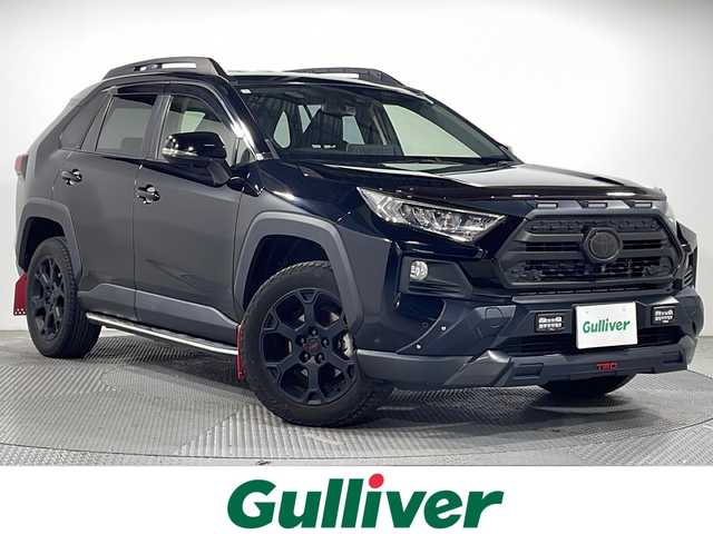 トヨタ ＲＡＶ４ アドベンチャー オフロードPKG 広島県 2021(令3)年 2.5万km アティチュードブラックマイカ TRDフロントバンパーガーニッシュ/TRDフロントロアガーニッシュ/TRD18インチアルミホイール/TRDマッドフラップ/モデリスタタフブレード/純正9型ディスプレイオーディオ（AppleCarPlay/AndroidAuto）/パノラミックビューモニター/黒革シート/パワーシート/シートヒーター/ベンチレーション/ステアリングヒーター/セーフティセンス/・プリクラッシュセーフティ/・レーントレーシングアシスト/・オートマチックハイビーム/・レーダークルーズコントロール/ブラインドスポットモニター/クリアランスソナー/ダウンヒルアシストコントロール/電動パーキングブレーキ/オートブレーキホールド/LEDヘッドランプ/ETC/USB入力端子