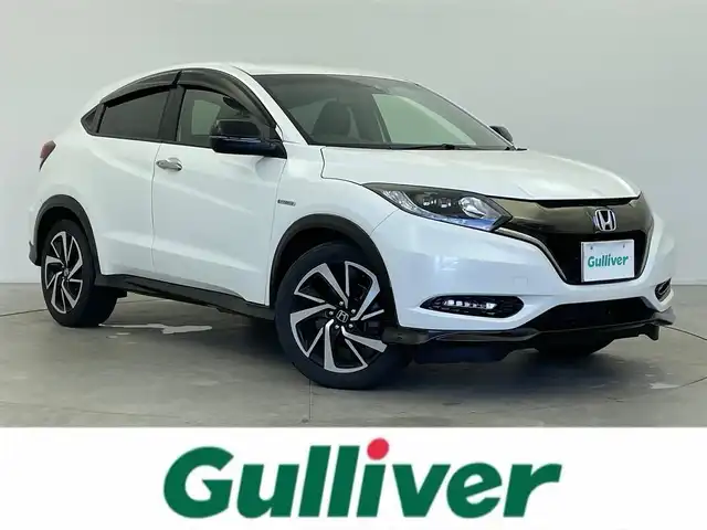 ホンダ ヴェゼル ハイブリッド RS ホンダセンシング 富山県 2017(平29)年 4.3万km ホワイトオーキッドパール 純正ナビ（AM/FM/CD/DVD/USB/BT）/フルセグTV/バックカメラ/衝突被害軽減ブレーキ/アダプティブクルーズコントロール/レーンキープアシスト/オートLEDライト/ビルトインETC/パドルシフト/ハーフレザーシート/前席シートヒーター/スマートキー×２/プッシュスタート/純正フロアマット/取扱説明書/保証書