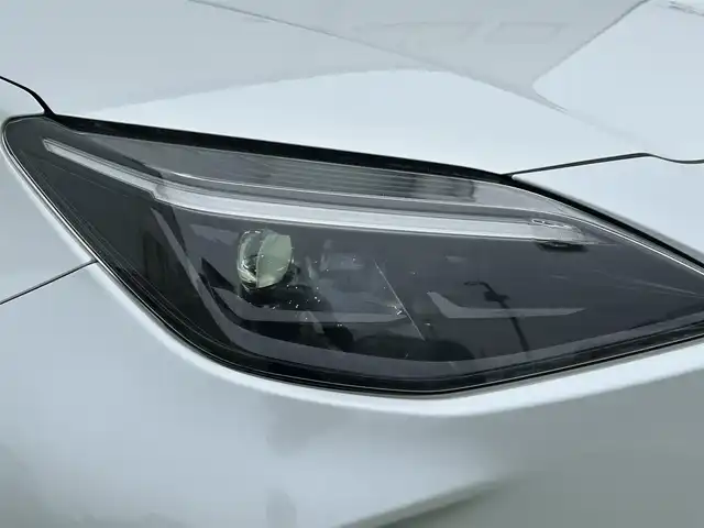 トヨタ ヤリスクロス ハイブリッド Z 香川県 2022(令4)年 2.5万km プラチナホワイトパールマイカ 純正ディスプレイオーディオ/【TV、BT、ナビ】/パノラマミックビューモニターOP/電動リアゲートOP/トヨタセーフティーセンス/・プリクラッシュ【衝突軽減】/・LDA【車線脱警報】/・ブラインドスポットモニター/ハーフレザーシート/シートヒーター/D席パワーシート/ハンドルヒーター/LEDヘッドライト/オートマチックハイビーム/革巻きステアリング/ステアリングスイッチ/レーダークルーズコントロール/ETC/純正AW18インチ/スマートキー/プッシュスタート