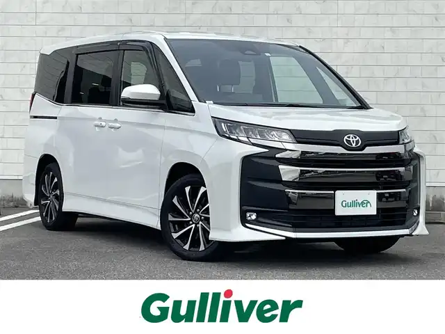 トヨタ ノア S－Z 宮崎県 2023(令5)年 1.3万km ホワイトパールクリスタルシャイン ワンオーナー/純正ナビ/(AM.FM.Bluetooth.DVD.CD)/バックカメラ/クリアランスソナー/両側パワースライドドア/シートヒーター/ハーフレザー/レーダークルーズコントロール/プリクラッシュセーフティー/LEDライト/ドアバイザー/純正フロアマット/純正ユニバーサルステップ/スマートキー/スペアキー