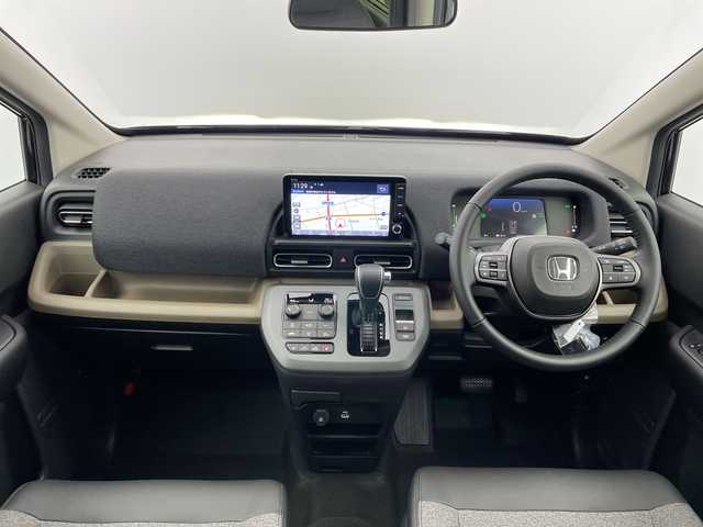 ホンダ フリード ハイブリット e:HEV AIR EX 富山県 2025(令7)年 0.1千km クリスタルブラックパール 登録済未使用車/4WD/寒冷地仕様/純正9インチナビ【LXM-242ZFNI】/（AM/FM/USB/BT/AppleCarPlay/AndroidAuto）/フルセグTV/バックカメラ/両側パワースライドドア/衝突被害軽減ブレーキ/レーンキープアシスト/アダプティブクルーズコントロール/ブラインドスポットモニター/オートマチックハイビーム/コーナーセンサー前後/ハーフレザーシート/前席シートヒーター/スマートキー×２/プッシュスタート/純正15インチAW/取扱説明書/保証書