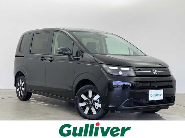 ホンダ フリード ハイブリット e:HEV AIR EX 富山県 2025(令7)年 0.1千km クリスタルブラックパール 登録済未使用車/4WD/寒冷地仕様/純正9インチナビ【LXM-242ZFNI】/（AM/FM/USB/BT/AppleCarPlay/AndroidAuto）/フルセグTV/バックカメラ/両側パワースライドドア/衝突被害軽減ブレーキ/レーンキープアシスト/アダプティブクルーズコントロール/ブラインドスポットモニター/オートマチックハイビーム/コーナーセンサー前後/ハーフレザーシート/前席シートヒーター/スマートキー×２/プッシュスタート/純正15インチAW/取扱説明書/保証書