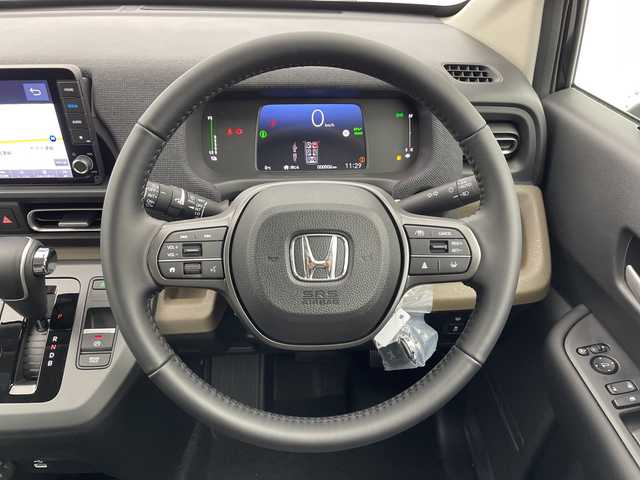 ホンダ フリード ハイブリット e:HEV AIR EX 富山県 2025(令7)年 0.1千km クリスタルブラックパール 登録済未使用車/4WD/寒冷地仕様/純正9インチナビ【LXM-242ZFNI】/（AM/FM/USB/BT/AppleCarPlay/AndroidAuto）/フルセグTV/バックカメラ/両側パワースライドドア/衝突被害軽減ブレーキ/レーンキープアシスト/アダプティブクルーズコントロール/ブラインドスポットモニター/オートマチックハイビーム/コーナーセンサー前後/ハーフレザーシート/前席シートヒーター/スマートキー×２/プッシュスタート/純正15インチAW/取扱説明書/保証書