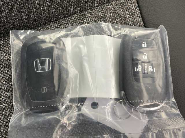 ホンダ フリード ハイブリット e:HEV AIR EX 富山県 2025(令7)年 0.1千km クリスタルブラックパール 登録済未使用車/4WD/寒冷地仕様/純正9インチナビ【LXM-242ZFNI】/（AM/FM/USB/BT/AppleCarPlay/AndroidAuto）/フルセグTV/バックカメラ/両側パワースライドドア/衝突被害軽減ブレーキ/レーンキープアシスト/アダプティブクルーズコントロール/ブラインドスポットモニター/オートマチックハイビーム/コーナーセンサー前後/ハーフレザーシート/前席シートヒーター/スマートキー×２/プッシュスタート/純正15インチAW/取扱説明書/保証書