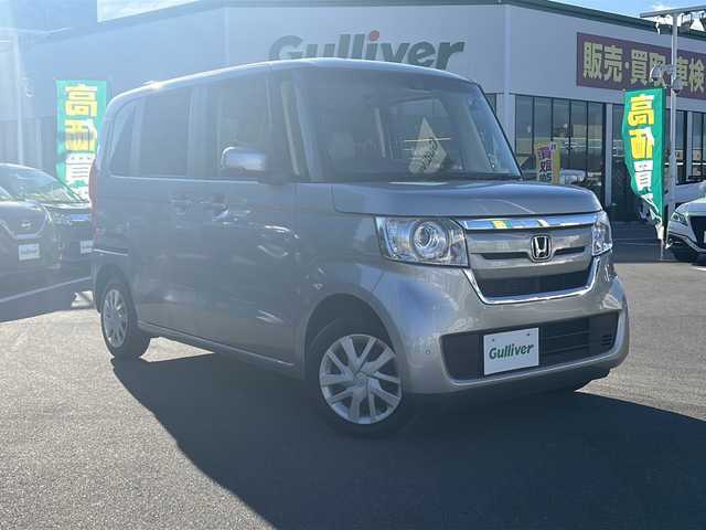ホンダ Ｎ ＢＯＸ G L ターボ ホンダセンシング 長野県 2020(令2)年 3.5万km ルナシルバーM 禁煙車/4WD/ターボ/社外ナビ【AVIC-RZ003】/(Bluetooth/SD)/ホンダセンシング/・衝突軽減ブレーキ/・誤発進抑制機能/・歩行者事故低減ステアリング/・路外逸脱抑制機能/・アダプティブクルーズコントロール/・車線維持支援システム/・先行車発進お知らせ機能/・標識認識機能/・後方誤発進抑制機能/・オートハイビーム/バックカメラ/ビルトインETC/両側パワースライドドア/ドライブレコーダー/シートヒーター/革巻きステアリング/パドルシフト/ステアリングスイッチ/リアサンシェード/ベンチシート/LEDヘッドライト/オートライト/スマートキー/Pスタート/電動格納ミラー