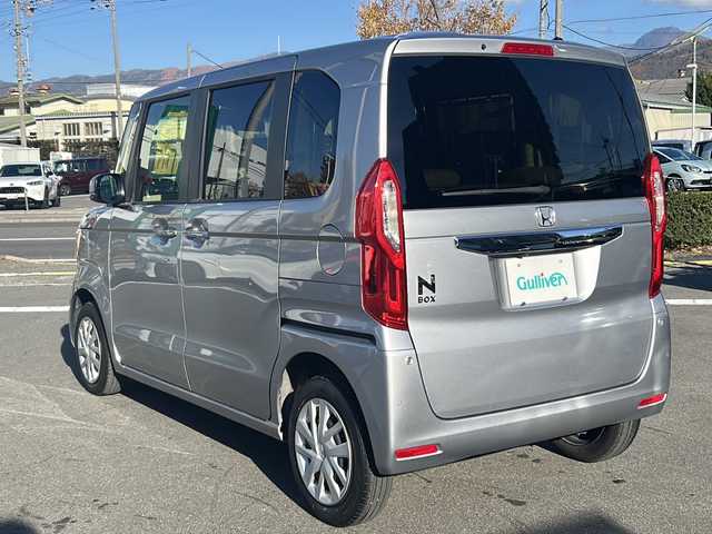 ホンダ Ｎ ＢＯＸ G L ターボ ホンダセンシング 長野県 2020(令2)年 3.5万km ルナシルバーM 禁煙車/4WD/ターボ/社外ナビ【AVIC-RZ003】/(Bluetooth/SD)/ホンダセンシング/・衝突軽減ブレーキ/・誤発進抑制機能/・歩行者事故低減ステアリング/・路外逸脱抑制機能/・アダプティブクルーズコントロール/・車線維持支援システム/・先行車発進お知らせ機能/・標識認識機能/・後方誤発進抑制機能/・オートハイビーム/バックカメラ/ビルトインETC/両側パワースライドドア/ドライブレコーダー/シートヒーター/革巻きステアリング/パドルシフト/ステアリングスイッチ/リアサンシェード/ベンチシート/LEDヘッドライト/オートライト/スマートキー/Pスタート/電動格納ミラー