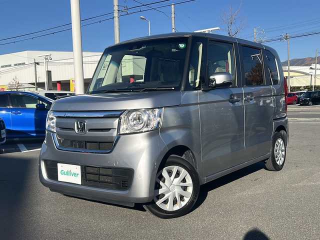ホンダ Ｎ ＢＯＸ G L ターボ ホンダセンシング 長野県 2020(令2)年 3.5万km ルナシルバーM 禁煙車/4WD/ターボ/社外ナビ【AVIC-RZ003】/(Bluetooth/SD)/ホンダセンシング/・衝突軽減ブレーキ/・誤発進抑制機能/・歩行者事故低減ステアリング/・路外逸脱抑制機能/・アダプティブクルーズコントロール/・車線維持支援システム/・先行車発進お知らせ機能/・標識認識機能/・後方誤発進抑制機能/・オートハイビーム/バックカメラ/ビルトインETC/両側パワースライドドア/ドライブレコーダー/シートヒーター/革巻きステアリング/パドルシフト/ステアリングスイッチ/リアサンシェード/ベンチシート/LEDヘッドライト/オートライト/スマートキー/Pスタート/電動格納ミラー
