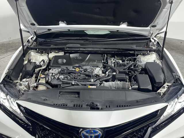 トヨタ カムリ WSレザーパッケージ 沖縄県 2019(平31)年 4.7万km プラチナホワイトパールマイカ 禁煙車　/純正８インチナビ[B9108]　/（フルセグTV CD DVD Bluetooth）/ムーンルーフ　/バックカメラ　/前方ドライブレコーダー　/電動パーキングブレーキ　/Toyota Safety Sense/・PCS（プリクラッシュセーフティ）/・LDA（レーンディパーチャーアラート）/・AHB（オートマチックハイビーム）/ＨＵＤ（ヘッドアップディスプレイ）　/ＢＳＭ（ブラインドスポットモニター）　/ＡＣ１００Ｖ　/ビルトインＥＴＣ　/レザーシート/パワーシート/シートヒーター