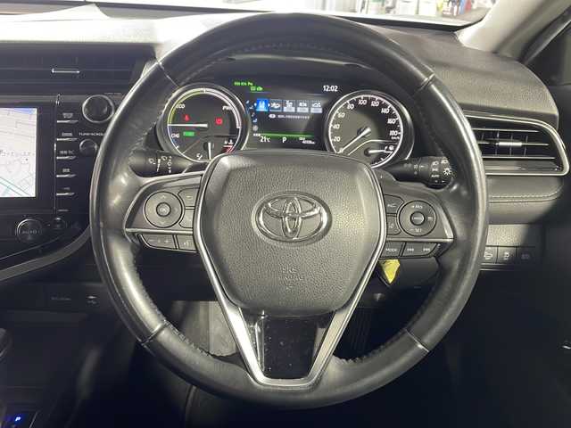 トヨタ カムリ WSレザーパッケージ 沖縄県 2019(平31)年 4.7万km プラチナホワイトパールマイカ 禁煙車　/純正８インチナビ[B9108]　/（フルセグTV CD DVD Bluetooth）/ムーンルーフ　/バックカメラ　/前方ドライブレコーダー　/電動パーキングブレーキ　/Toyota Safety Sense/・PCS（プリクラッシュセーフティ）/・LDA（レーンディパーチャーアラート）/・AHB（オートマチックハイビーム）/ＨＵＤ（ヘッドアップディスプレイ）　/ＢＳＭ（ブラインドスポットモニター）　/ＡＣ１００Ｖ　/ビルトインＥＴＣ　/レザーシート/パワーシート/シートヒーター