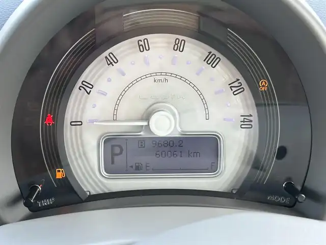 スズキ ラパン G 岡山県 2021(令3)年 6万km シフォンアイボリーM 登録時走行距離60061km/ワンオーナー/社外ナビ/フルセグTV/(AM.FM.TV.CD.DVD.BT)/バックカメラ/衝突軽減ブレーキ/レーンキープアシスト/横滑り防止装置/盗難防止装置/アイドリングストップ/コーナーセンサー/シートヒーター(D席)/純正フロアマット/プッシュスタート/オートライト/USB入力端子