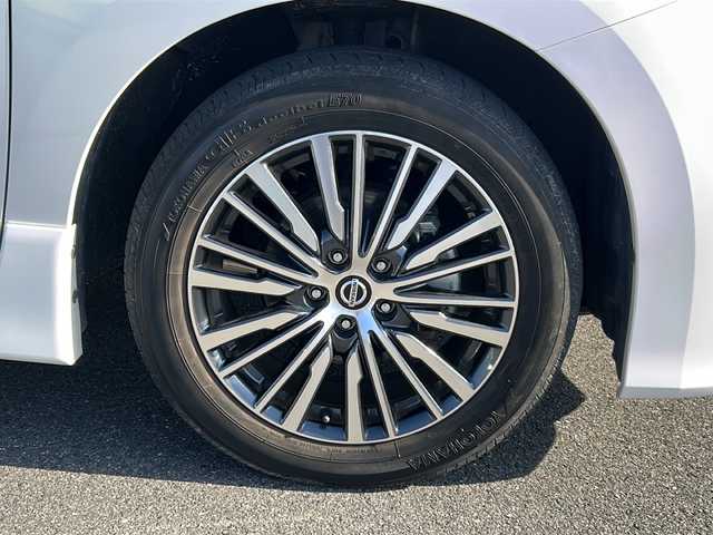 日産 エルグランド 250ハイウェイスターS 岐阜県 2022(令4)年 2.4万km ピュアホワイトパール 登録時走行距離23475km/社外SDナビ　/後席モニター　/レーダークルーズコントロール　/ＥＴＣ　/全方位カメラ　/両側パワースライドドア/衝突軽減システム　/盗難防止装置　/横滑り防止装置　/前後コーナーセンサー　/レーンキープアシスト　/ＬＥＤヘッドライト/オートライト/プッシュスタート/スマートキー/スペアキー1本/iPod接続/純正18インチアルミホイール/社外フロアマット