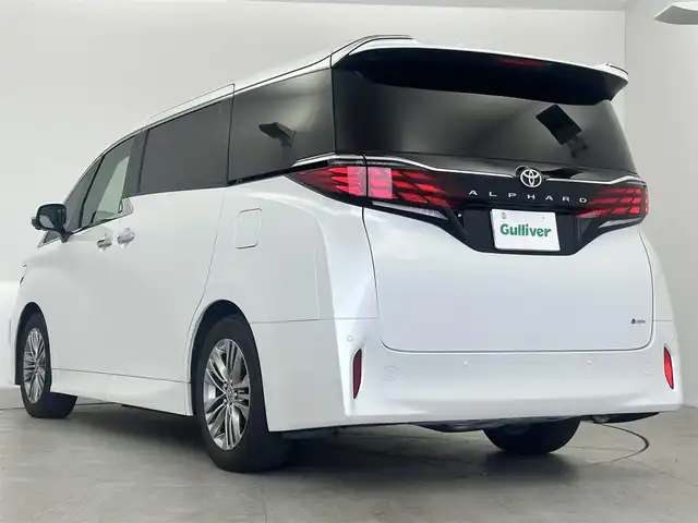 トヨタ アルファードハイブリット Z 愛知県 2024(令6)年 1.9万km プラチナホワイトパールマイカ モデリスタ　/　　・フロントグリル/ユニバーサルステップ/純正フリップダウンモニター/左右独立ムーンルーフ/サイドエンブレムイルミネーション/トヨタチームメイト/　　・アドバンスドライブ/　　・アドバンストパーク/　　・ドライバー異常時対応システム/ドライブレコーダー（前後）/デジタルインナーミラー/純正コネクテッドナビ対応ディスプレイオーディオ/(フルセグ/BT/HDMI/スマホ連動)/ビルトインETC/パノラミックビューモニター/トヨタセーフティセンス/BSM/USB充電ポート/置くだけ充電/HUD/ステアリングリモコン/ステアリングヒーター/パワーシート/メモリーシート/1・2列目シートヒーター/1・2列目ベンチレーション/両側パワースライドドア/サイドサンシェード