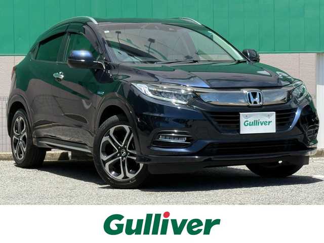 ホンダ ヴェゼル ハイブリッド Z ホンダセンシング 千葉県 2020(令2)年 2.6万km ミッドナイトブルービームM 純正メモリナビ（Bluetooth/AM/FM/CD/DVD/iPod/AUX)/フルセグTV/バックカメラ/前後純正ドライブレコーダー/追従クルーズコントロール/ホンダセンシング/パドルシフト/リバース連動ドアミラー/ブレーキホールド/ETC/ハーフレザーシート/前席シートヒーター/純正フロアマット/純正ホイール/ドアバイザー/プッシュスタート/スマートキー