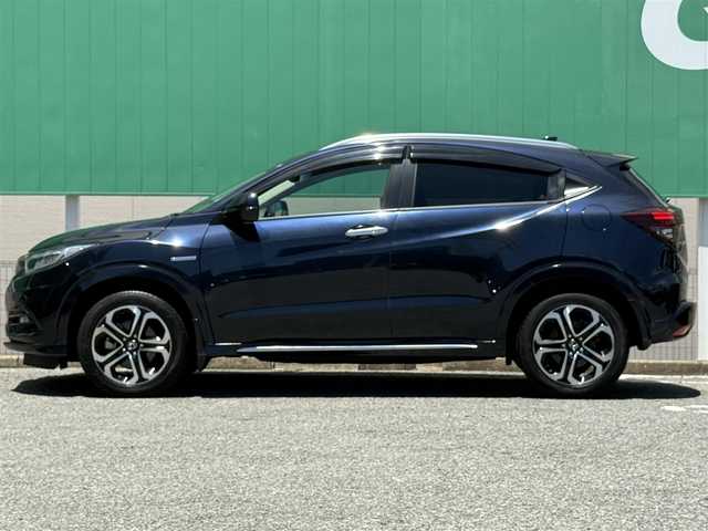 ホンダ ヴェゼル ハイブリッド Z ホンダセンシング 千葉県 2020(令2)年 2.6万km ミッドナイトブルービームM 純正メモリナビ（Bluetooth/AM/FM/CD/DVD/iPod/AUX)/フルセグTV/バックカメラ/前後純正ドライブレコーダー/追従クルーズコントロール/ホンダセンシング/パドルシフト/リバース連動ドアミラー/ブレーキホールド/ETC/ハーフレザーシート/前席シートヒーター/純正フロアマット/純正ホイール/ドアバイザー/プッシュスタート/スマートキー