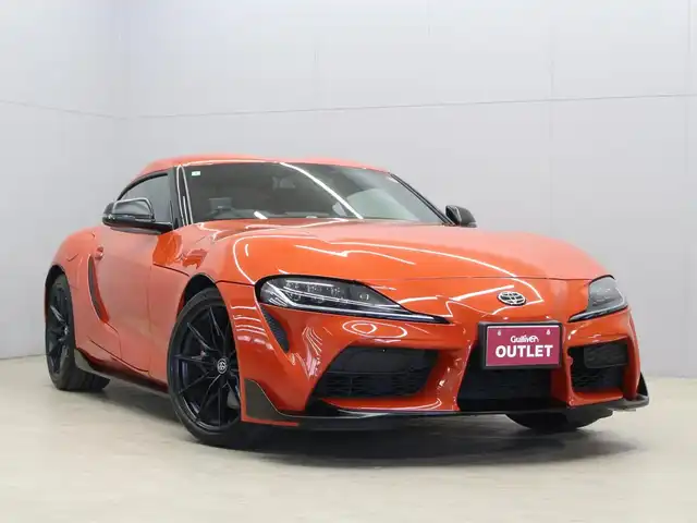 トヨタ スープラ RZ プラズマオレンジ100ED 三重県 2024(令6)年 0.7万km オレンジ 100台限定車/専用ボディ色プラズマオレンジ(D19)/ワンオーナー /プリクラッシュセーフティ/レーンディパーチャーアラート/ブラインドスポットモニター/HDDナビゲーションシステム/・8.8インチタッチディスプレイ/・地デジTV/・HDDオーディオ/・Toyota Supra Connect/・Bluetooth/JBLプレミアムサウンドシステム(12スピーカー)/バックカメラ/リアクロストラフィックアラート/ブラックアルカンターラ/革コンビシート/・シートヒーター/パワーシート/コムテック前後ドライブレコーダー/ユピテルGPSレーダー探知機/ETC/純正19インチ10本スポークマットブラック塗装鍛造アルミホイール/「GR」ロゴ入brembo製ブラックブレーキキャリパー（フロント）/6灯式LEDヘッドランプ/・アダプティブハイビーム/オートライト/プッシュエンジンスタート/スマートキー/新車時保証書/取扱説明書