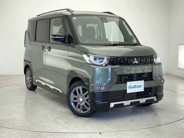 三菱 デリカミニ T プレミアム 千葉県 2025(令7)年 0.1千km ＤグリーンⅡ 横滑り防止/衝突軽減/カーテンエアバック/Wサイドエアバック/9型ディスプレイオーディオ/BT/USB/アイドリングストップ/純正アルミホイール/全方位カメラ/ヒートステアリング/サイドデカール/デジタルインナーミラー/電動格納デアミラー
