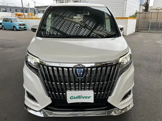 トヨタ エスクァイア ハイブリッド Gi 宮城県 2017(平29)年 7.4万km ホワイトパールクリスタルシャイン 社外ナビ/（アルパイン）/（フルセグTV/Bluetooth/CD/DVD/USB)/・バックカメラ/・ドライブレコーダー/・クルーズコントロール/・レーンキープアシスト/・衝突軽減装置/・両側パワースライドドア/・革シート/・前席シートヒーター/・モデリスタ　フロントバンパー/・革ステアリング/・ステアリングスイッチ/・電動格納ウィンカーミラー/・電動パーキングブレーキ/・ETC/・ISOFIX/・LEDライト/・フロントフォグランプ/・オートライト/・オートハイビーム/・社外15インチアルミホイール/・Wエアバッグ/ABS/・フロアマット/・バイザー/・リアプライバシーガラス/・スペアキー×1/・スマートキー/・プッシュスタート/・保証書/・取扱説明書