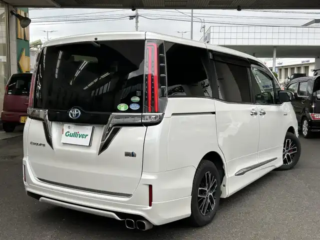 トヨタ エスクァイア ハイブリッド Gi 宮城県 2017(平29)年 7.4万km ホワイトパールクリスタルシャイン 社外ナビ/（アルパイン）/（フルセグTV/Bluetooth/CD/DVD/USB)/・バックカメラ/・ドライブレコーダー/・クルーズコントロール/・レーンキープアシスト/・衝突軽減装置/・両側パワースライドドア/・革シート/・前席シートヒーター/・モデリスタ　フロントバンパー/・革ステアリング/・ステアリングスイッチ/・電動格納ウィンカーミラー/・電動パーキングブレーキ/・ETC/・ISOFIX/・LEDライト/・フロントフォグランプ/・オートライト/・オートハイビーム/・社外15インチアルミホイール/・Wエアバッグ/ABS/・フロアマット/・バイザー/・リアプライバシーガラス/・スペアキー×1/・スマートキー/・プッシュスタート/・保証書/・取扱説明書