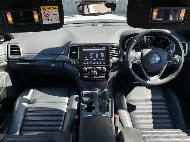 クライスラー・ジープ グランドチェロキー S－LTD 青森県 2020(令2)年 5.4万km ブライトホワイト /４WD/黒革シート/D席メモリー付き前席パワーシート/前席シートヒーター/UconnectナビフルセグTV/　（ Bluetooth CarPlay対応）/バック/サイドカメラ/パワーテールゲート/DSRC・ETC/革巻きステア/ノブ/パドルシフト/ステアヒーター/ミラーヒーター/電動チルトステア/電各調整ミラー/ブラックルーフレール/ヒルディセントコントロール/ブレーキアシスト/パーキングアシスト/トラクションコントロール/前後バンパーソナー/ヘットライトウオッシャー/前後フォグランプ/アイドリングストップ/横滑り防止機能/W/サイド/カーテン/ニーエアバッグ/ABS/スマートキーｘ２/保証書/取説