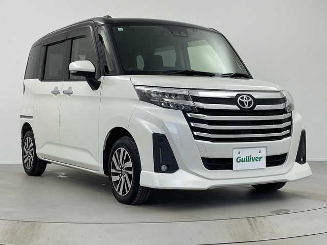 トヨタ ルーミー カスタムG 奈良県 2020(令2)年 0.8万km ブラックマイカメタリック/パールホワイト2トーン 純正9インチメモリナビ/フルセグTV/Bluetoothオーディオ/DVD/TVキャンセラー/バックカメラ/スマートアシストIII/衝突軽減ブレーキ/車線逸脱警報/全車速追従機能付きアダプティブクルーズコントロール/電動パーキングブレーキ/両側ウェルカムパワースライドドア/純正前後ドラレコ/LEDライト/ウインカーミラー/スペアキー