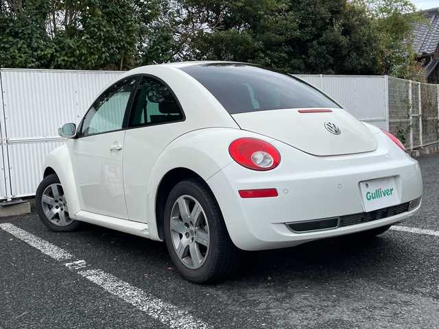 フォルクスワーゲン ニュー ビートル 茨城県 2008(平20)年 4万km カンパネーラホワイト ナビ【DVD/MD/AUX】/ETC/ドライブレコーダー/フォグランプ/クリアランスソナーセンサー/純正アルミホイール/ABS/横滑り防止装置/USB/保証書/取扱説明書/スペアキー×１