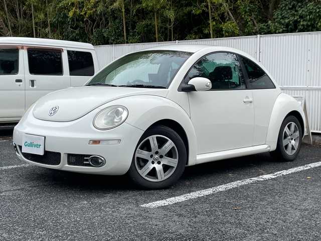 フォルクスワーゲン ニュー ビートル 茨城県 2008(平20)年 4万km カンパネーラホワイト ナビ【DVD/MD/AUX】/ETC/ドライブレコーダー/フォグランプ/クリアランスソナーセンサー/純正アルミホイール/ABS/横滑り防止装置/USB/保証書/取扱説明書/スペアキー×１