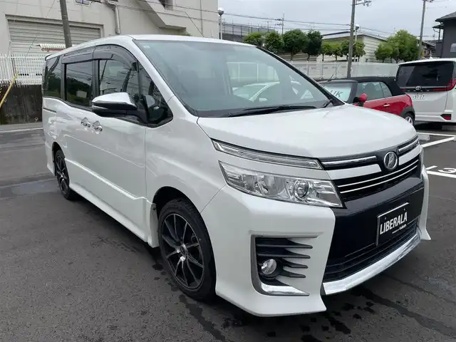トヨタ ヴォクシー ZS 煌 大阪府 2015(平27)年 6.6万km ホワイトパールクリスタルシャイン 純正ナビ/バックカメラ/フルセグ/両側パワースライドドア/プッシュスタート/スマートキー/フリップダウンモニター/ETC