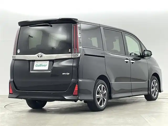 トヨタ ノア Si ダブルバイビーⅢ 福島県 2021(令3)年 4万km ブラック トヨタセーフティーセンス　/・PCS/・車線逸脱警報/・オートハイビーム/・クリアランスソナー/純正ＳＤナビゲーション　/【AM/FM/DVD/CD/Bluetooth/フルセグ】/型番:ZSZN-Z68T/純正フリップダウンモニター　/前後ドライブレコーダー　/バックカメラ　/両側パワースライドドア　/クルーズコントロール/ハーフレザーシート/プッシュスタート　/・スマートキー　/純正ＥＴＣ　/ステアリングスイッチ/・チルトステリング/オートライト/・LEDライト/・フォグライト/冬タイヤ積み込み/【205/60/16IN】/純正フロアマット/取扱説明書/・ナビ取扱説明書