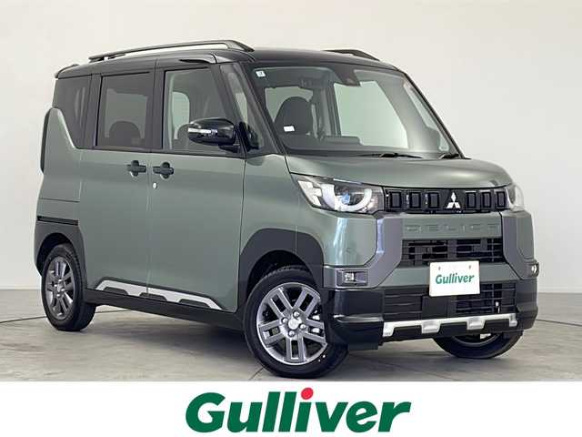 三菱 デリカミニ T プレミアム 愛知県 2025(令7)年 0.1千km 緑Ⅱ 未使用車・新車/９型ディスプレイオーディオ/全方位カメラ/Bluetooth・AppleCarPlay・AndroidAuto・USB/ルーフレール/ファブリック＆合皮シート/前席シートヒーター/ヒルディセントコントロール/ヒルスタートアシスト/アイドリングストップ/ACC/車線維持支援/車線逸脱警報/先行車発進告知/LEDヘッドライト/オートライト/オートマチックハイビーム/革巻きステアリング/ステアリングスイッチ/パドルシフト/電子パーキングブレーキ/オートホールド/スマートキー/プッシュスタート/スペアキー/新車保証書・取扱説明書