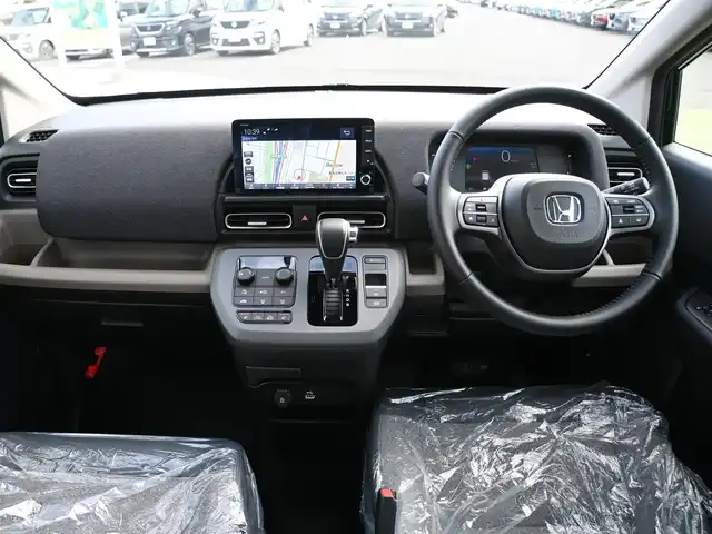 ホンダ フリード ハイブリット e:HEV AIR EX 千葉県 2025(令7)年 0.1千km クリスタルブラックパール e:HEV エアー　EX　2LB40Z　6人　9インチナビ　LXM-242ZFNI(207680円)/ホンダセンシング/・衝突軽減ブレーキ（CMBS）/・車線維持支援システム（LKAS）/・アダプティブクルーズコントロール（ACC）/・ブラインドスポットインフォメーション/・後方誤発進抑制機能/・誤発進抑制機能/両側パワースライドドア/ハーフレザーシート/前席シートヒーター/純正コネクトナビ/地デジTV/【Apple CarPlay　Android Auto対応】/【Bluetooth接続】/バックカメラ/革巻きステアリング/ステアリングスイッチ/LEDヘッドライト/ウインカーミラー/コーナーセンサー/純正15インチアルミホイル/サイド/カーテンエアバッグ/Honda スマートキー