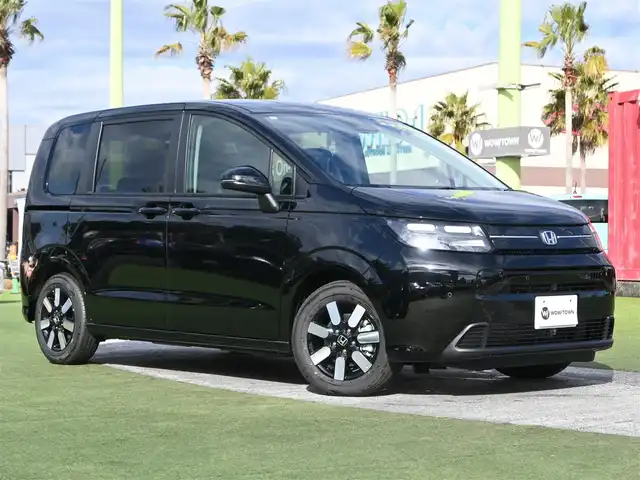 ホンダ フリード ハイブリット e:HEV AIR EX 千葉県 2025(令7)年 0.1千km クリスタルブラックパール e:HEV エアー　EX　2LB40Z　6人　9インチナビ　LXM-242ZFNI(207680円)/ホンダセンシング/・衝突軽減ブレーキ（CMBS）/・車線維持支援システム（LKAS）/・アダプティブクルーズコントロール（ACC）/・ブラインドスポットインフォメーション/・後方誤発進抑制機能/・誤発進抑制機能/両側パワースライドドア/ハーフレザーシート/前席シートヒーター/純正コネクトナビ/地デジTV/【Apple CarPlay　Android Auto対応】/【Bluetooth接続】/バックカメラ/革巻きステアリング/ステアリングスイッチ/LEDヘッドライト/ウインカーミラー/コーナーセンサー/純正15インチアルミホイル/サイド/カーテンエアバッグ/Honda スマートキー