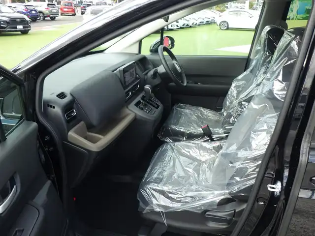 ホンダ フリード ハイブリット e:HEV AIR EX 千葉県 2025(令7)年 0.1千km クリスタルブラックパール e:HEV エアー　EX　2LB40Z　6人　9インチナビ　LXM-242ZFNI(207680円)/ホンダセンシング/・衝突軽減ブレーキ（CMBS）/・車線維持支援システム（LKAS）/・アダプティブクルーズコントロール（ACC）/・ブラインドスポットインフォメーション/・後方誤発進抑制機能/・誤発進抑制機能/両側パワースライドドア/ハーフレザーシート/前席シートヒーター/純正コネクトナビ/地デジTV/【Apple CarPlay　Android Auto対応】/【Bluetooth接続】/バックカメラ/革巻きステアリング/ステアリングスイッチ/LEDヘッドライト/ウインカーミラー/コーナーセンサー/純正15インチアルミホイル/サイド/カーテンエアバッグ/Honda スマートキー