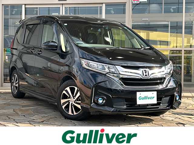 ホンダ フリード G ホンダセンシング 静岡県 2019(平31)年 6.9万km プレミアムスパークルブラックパール 純正ナビ/CD/DVD/AM/FM/フルセグTV/ipod/SD/USB/Bluetooth/AUX/主要装備/・純正ナビ　/・レーダークルーズコントロール　/・ドライブレコーダー　/・バックカメラ　/・ＥＴＣ　/・両側パワースライドドア　/・スマートキー　/・プッシュスタート　/・アイドリングストップ　/・ウォークスルー　/・ホンダセンシング/・レーンキープ/・オートライト/・ステアリングリモコン/・横滑り防止装置/・衝突軽減システム/・ヒーテッドドアミラー/・取扱説明書/・ワンオーナー/・保証書